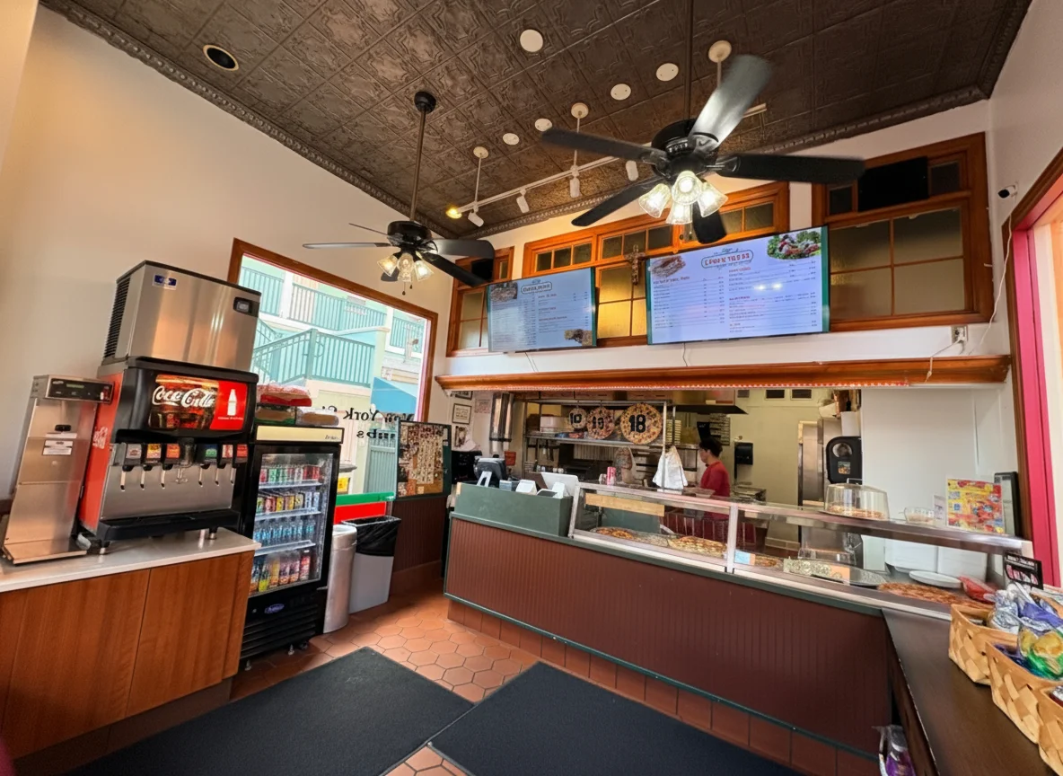 Cozy restaurant interior with menu boards and soda fountain