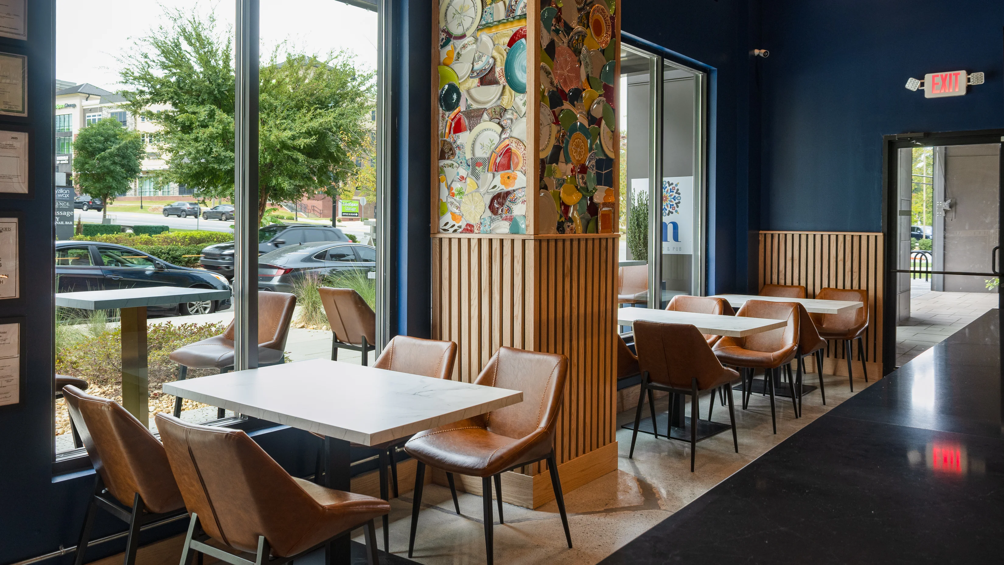 Modern restaurant interior with stylish seating and colorful decor