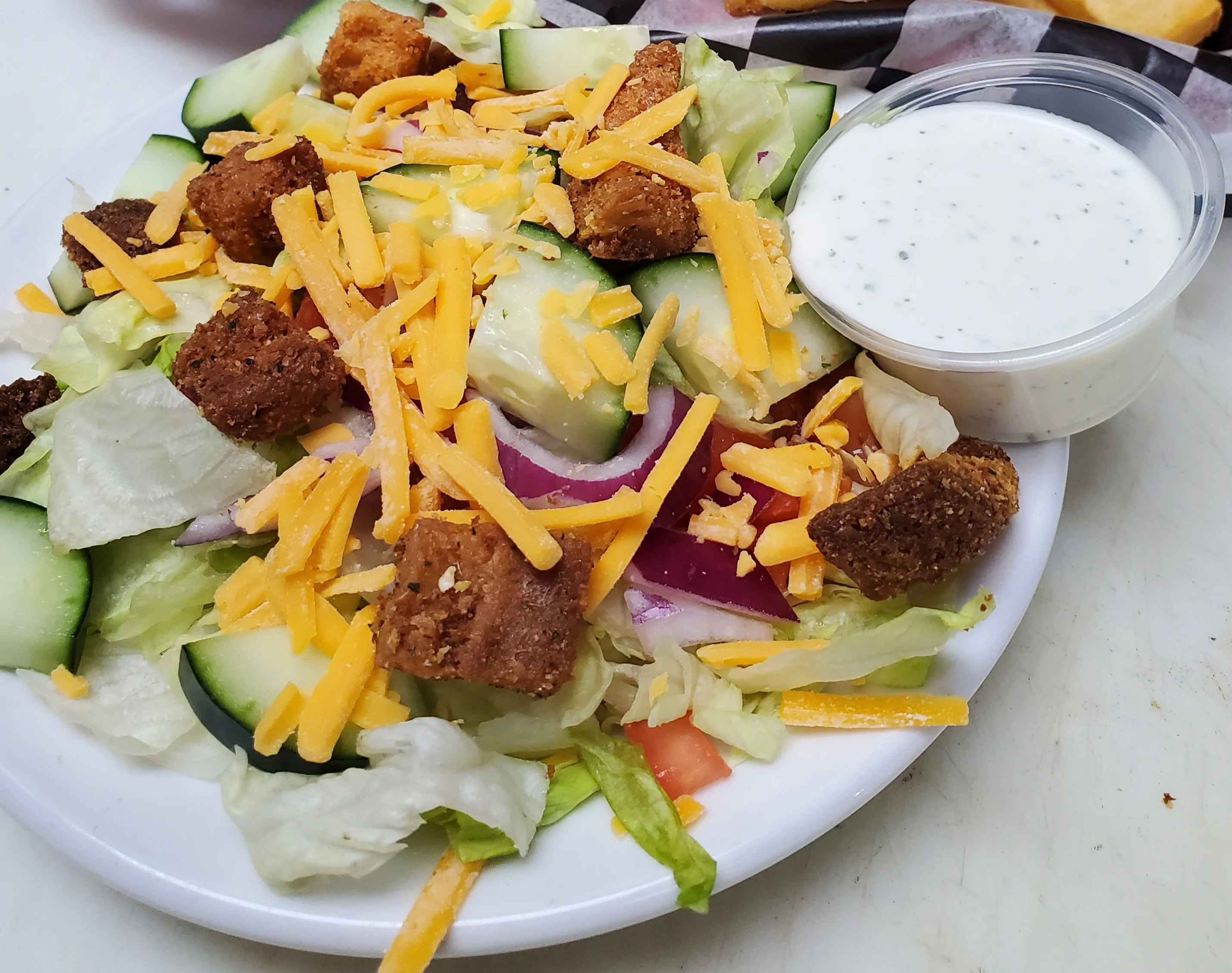 Fresh garden salad with ranch dressing
