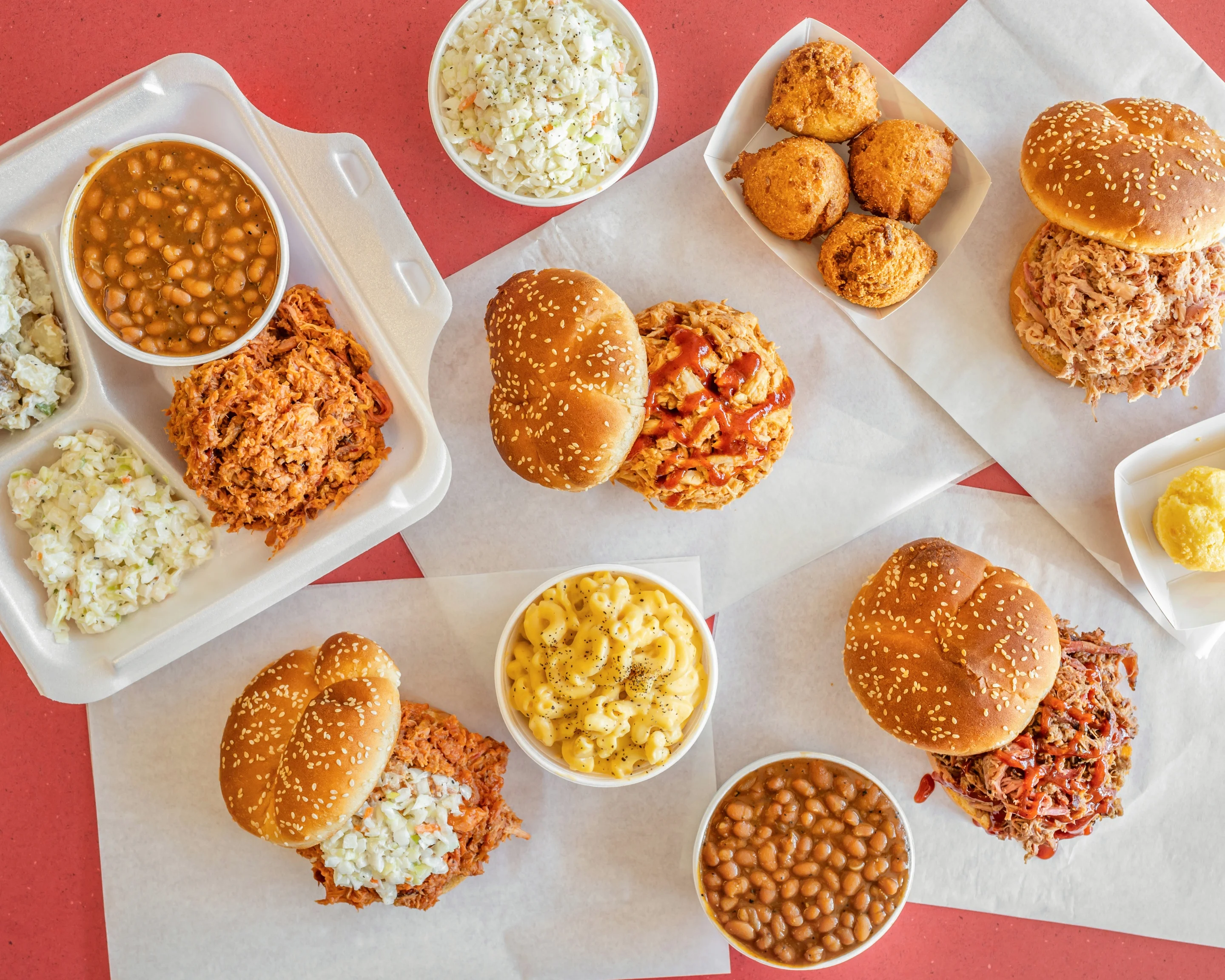 Southern barbecue platter with pulled pork sandwiches and sides