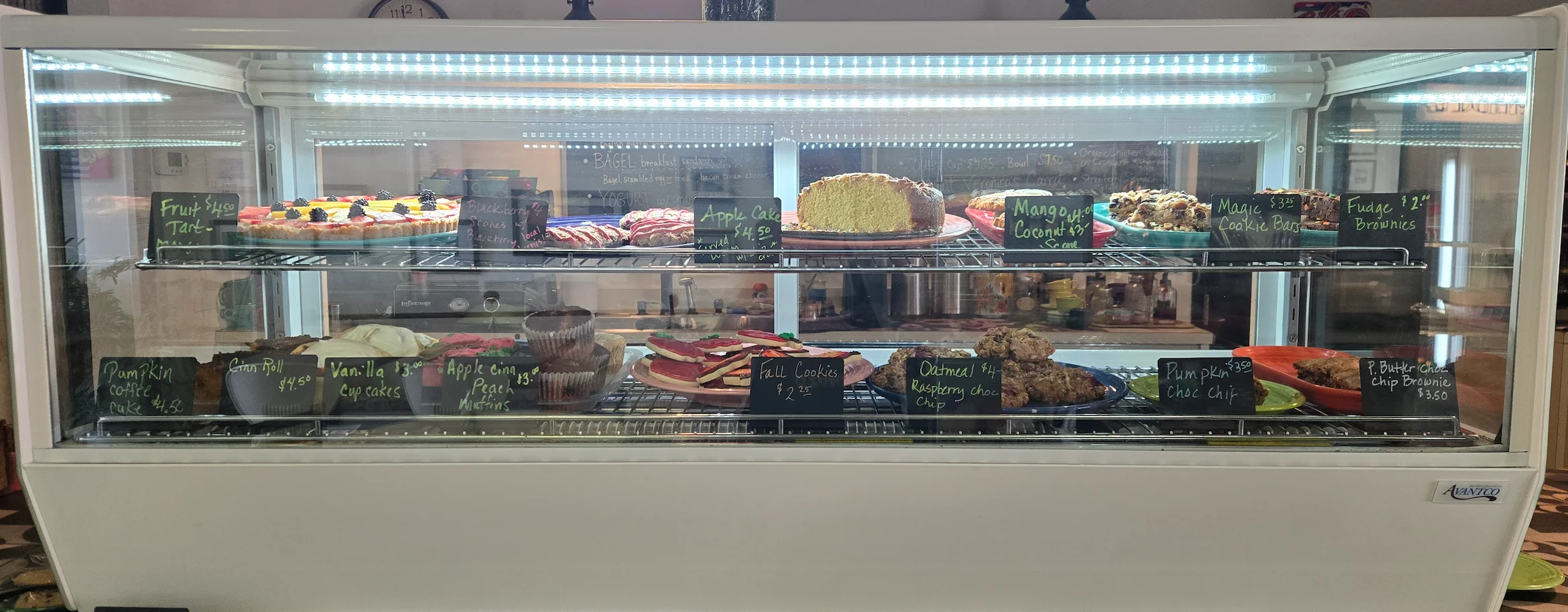 Display of assorted baked goods in a cozy café