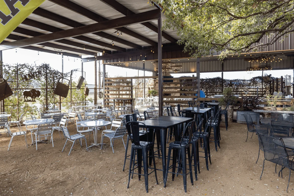 Delicious gourmet burger with fresh toppings on a wooden table