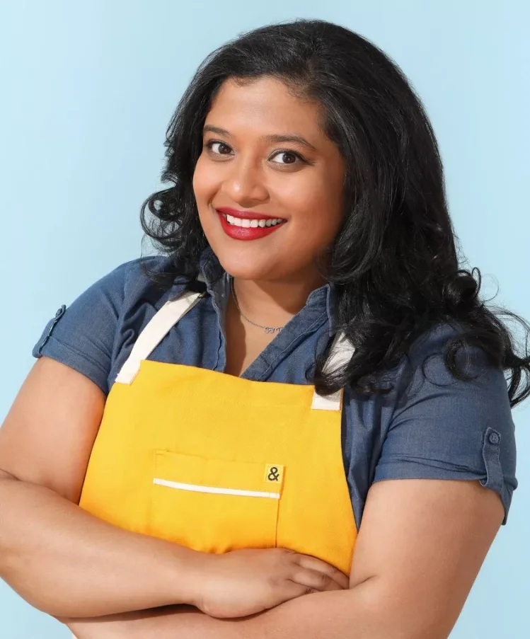 Saffron De Twah and Miss kim owners holding to go boxes