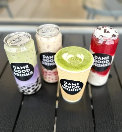 Colorful bubble tea drinks on a wooden table