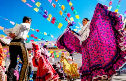 Colorful traditional dance performance with vibrant costumes