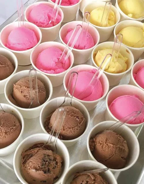 Colorful assortment of gelato in small cups
