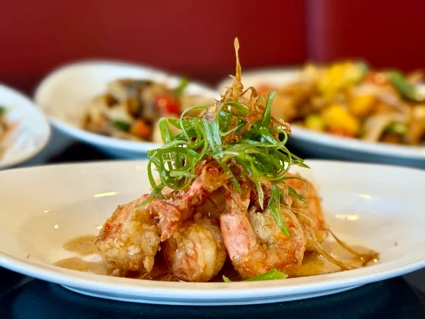 Crispy shrimp dish with scallions, a popular Asian delicacy