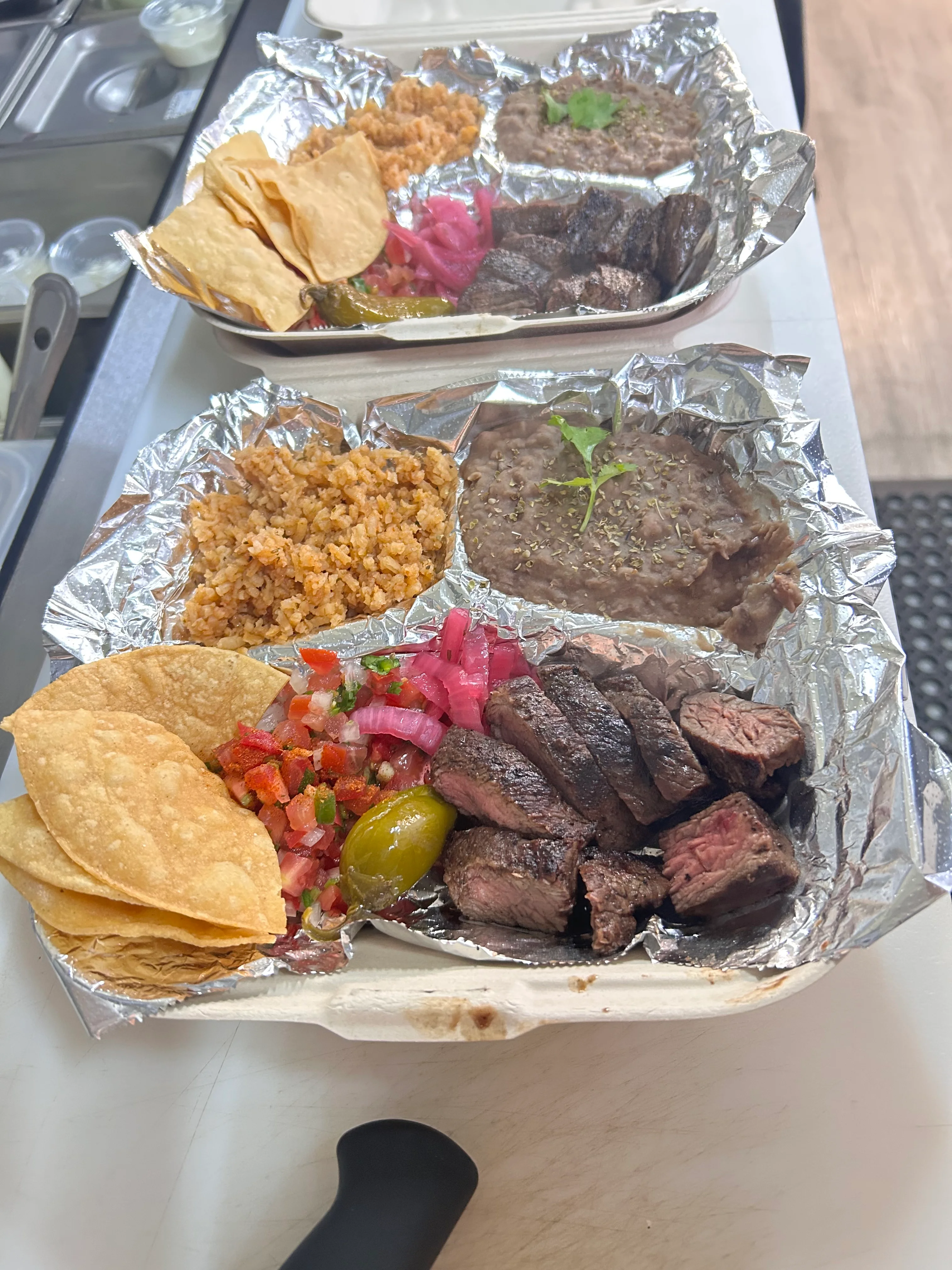 Authentic Mexican carne asada platter with sides
