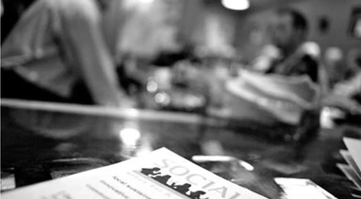 A vibrant restaurant interior with colorful decor and dining setup.