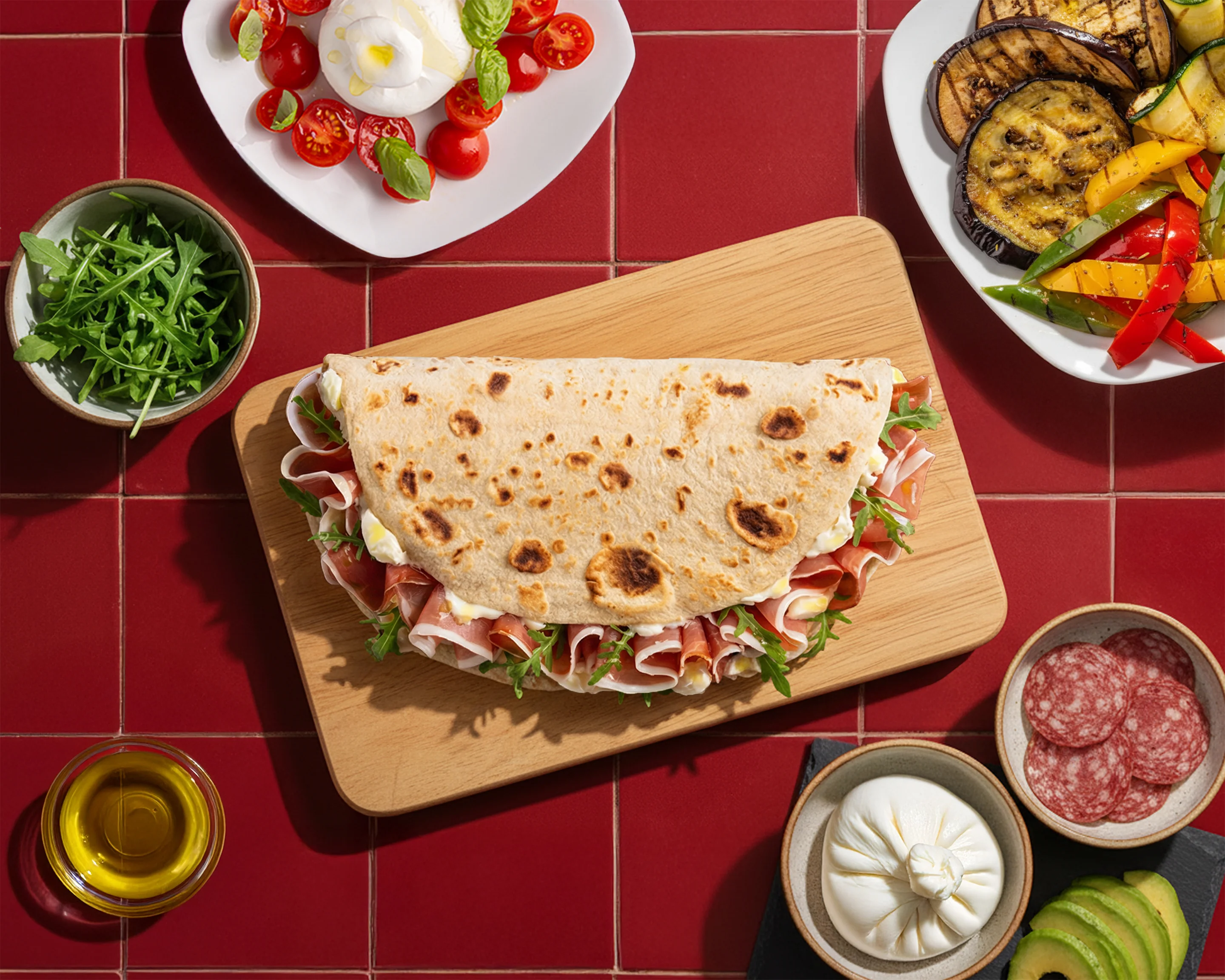 Italian piadina filled with cured meats and arugula