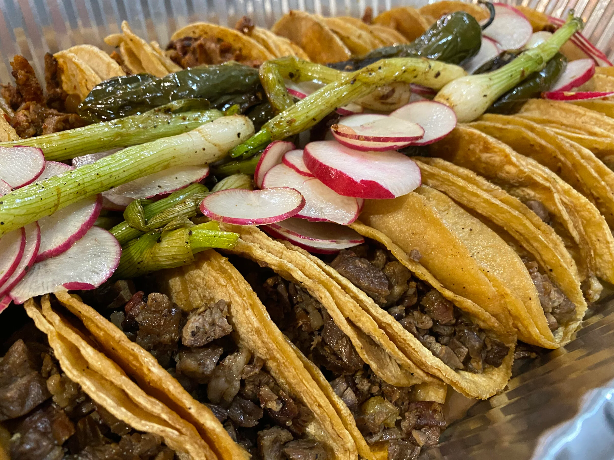 Delicious Mexican street tacos with grilled meat and fresh toppings