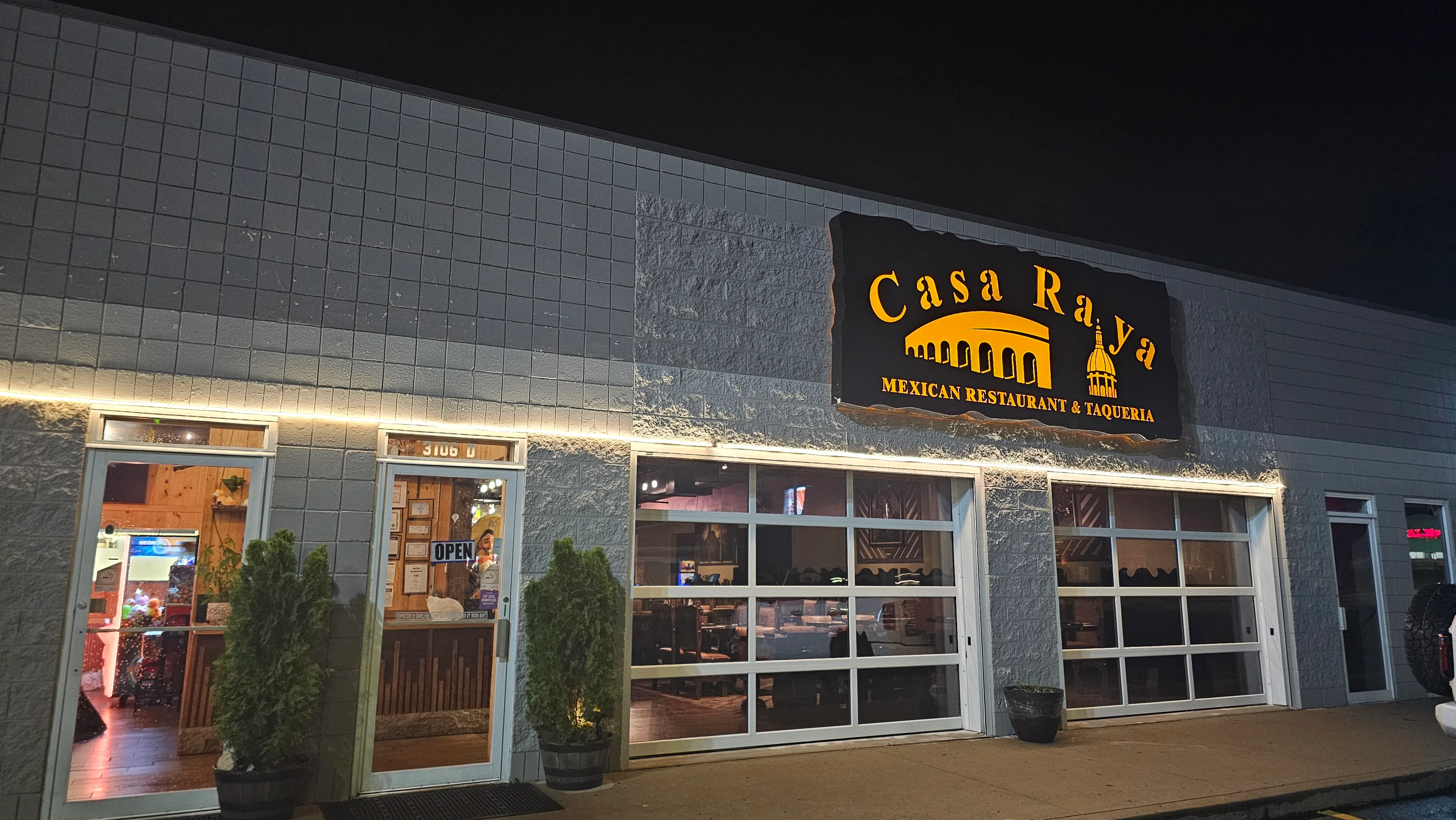 Exterior view of Casa Raya Mexican restaurant at night