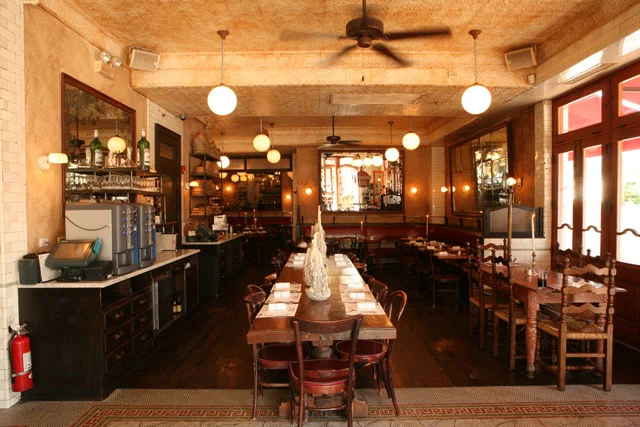 Charming restaurant interior with wooden tables and warm lighting