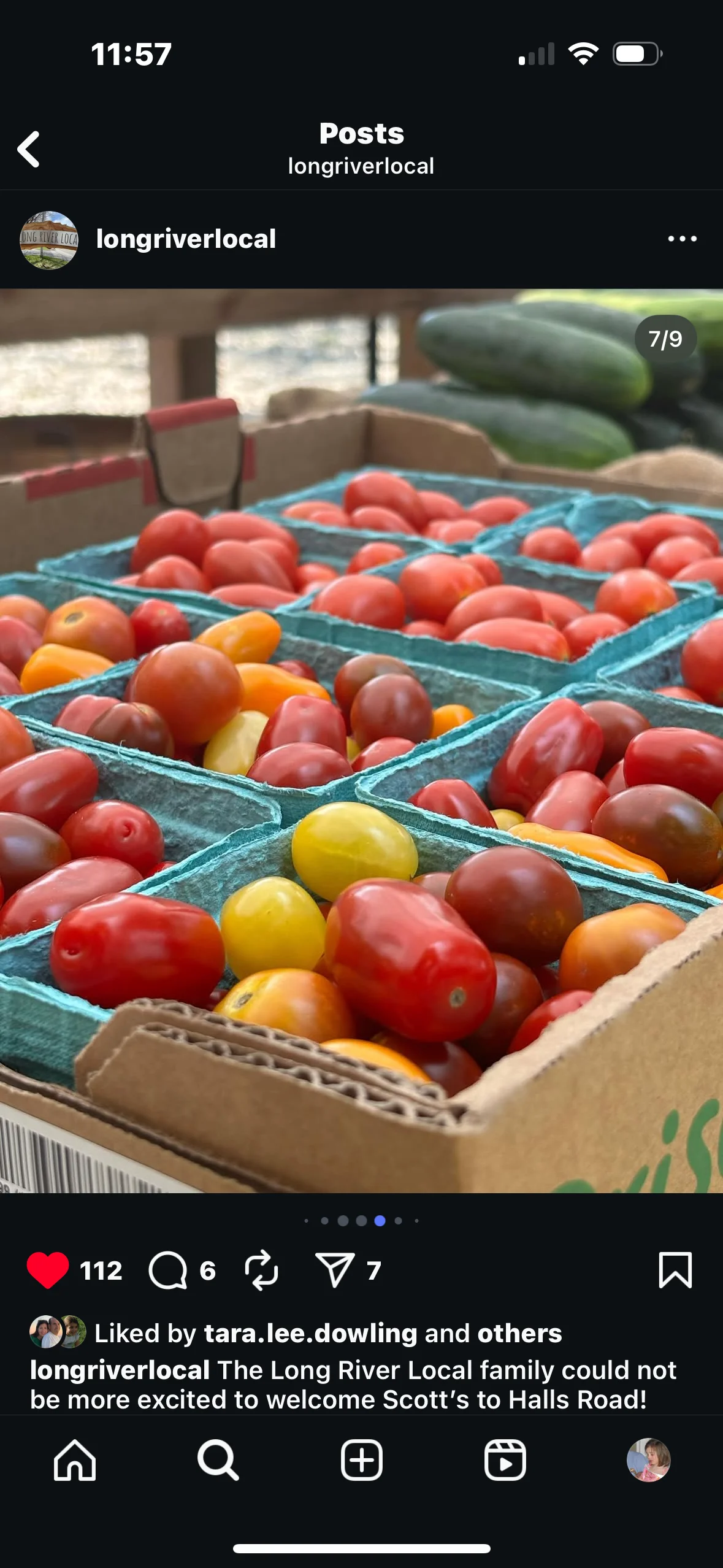 Freshly harvested heirloom tomatoes in baskets