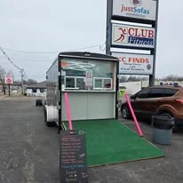 Delicious gourmet burger with fresh toppings on a wooden table