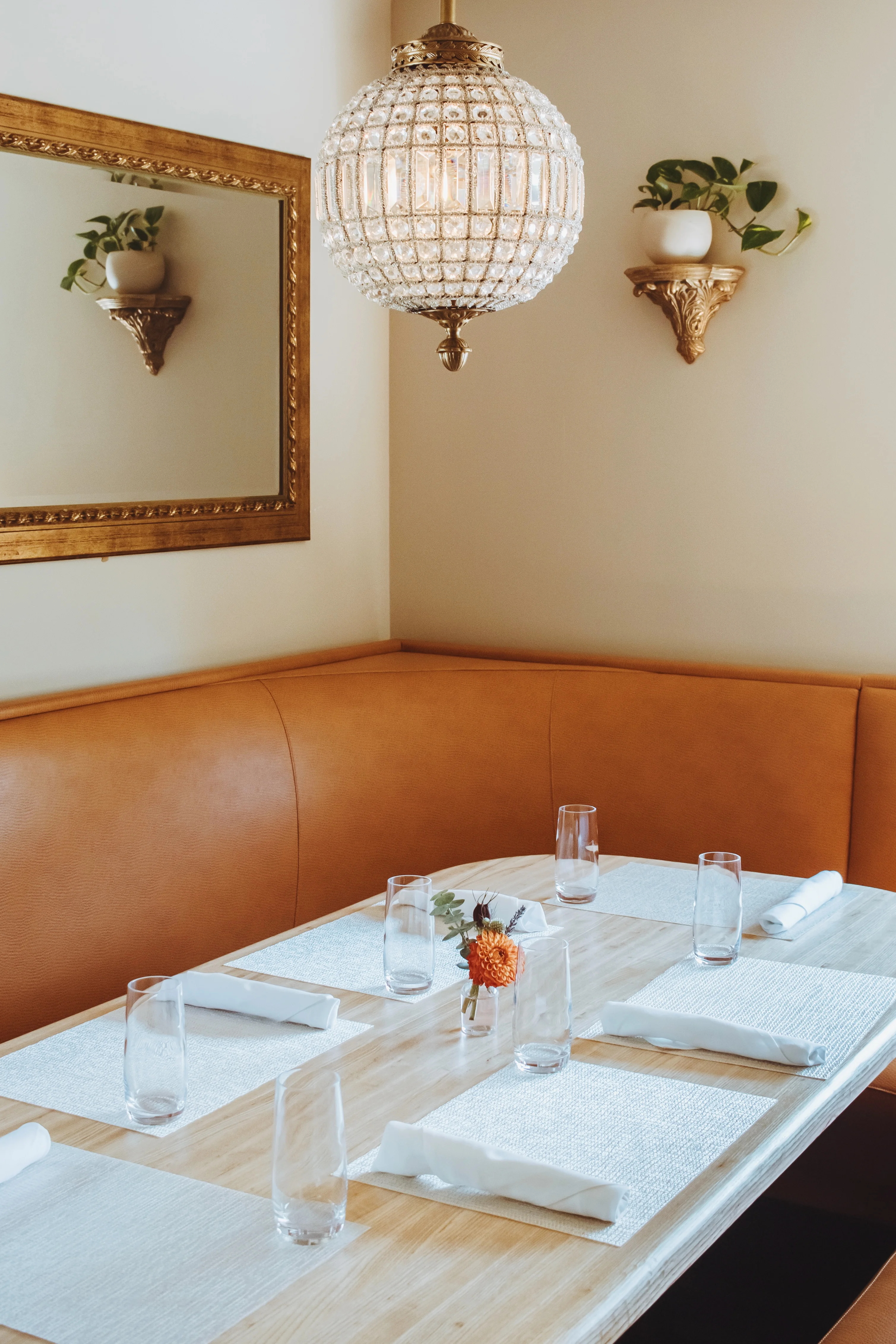Elegant restaurant interior with cozy seating and decorative lighting