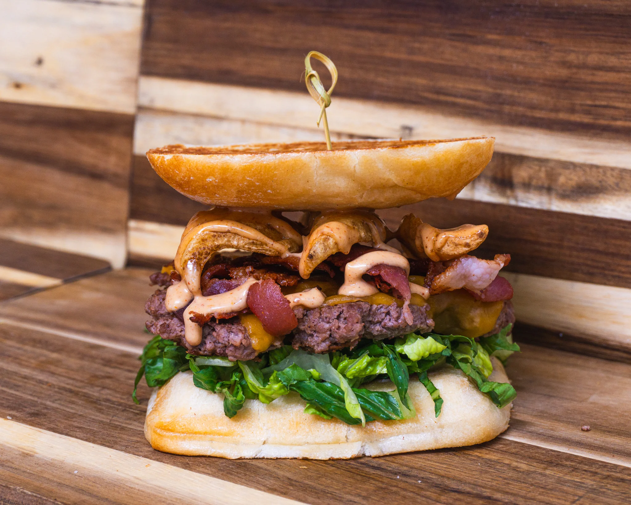 Juicy American cheeseburger with bacon and special sauce