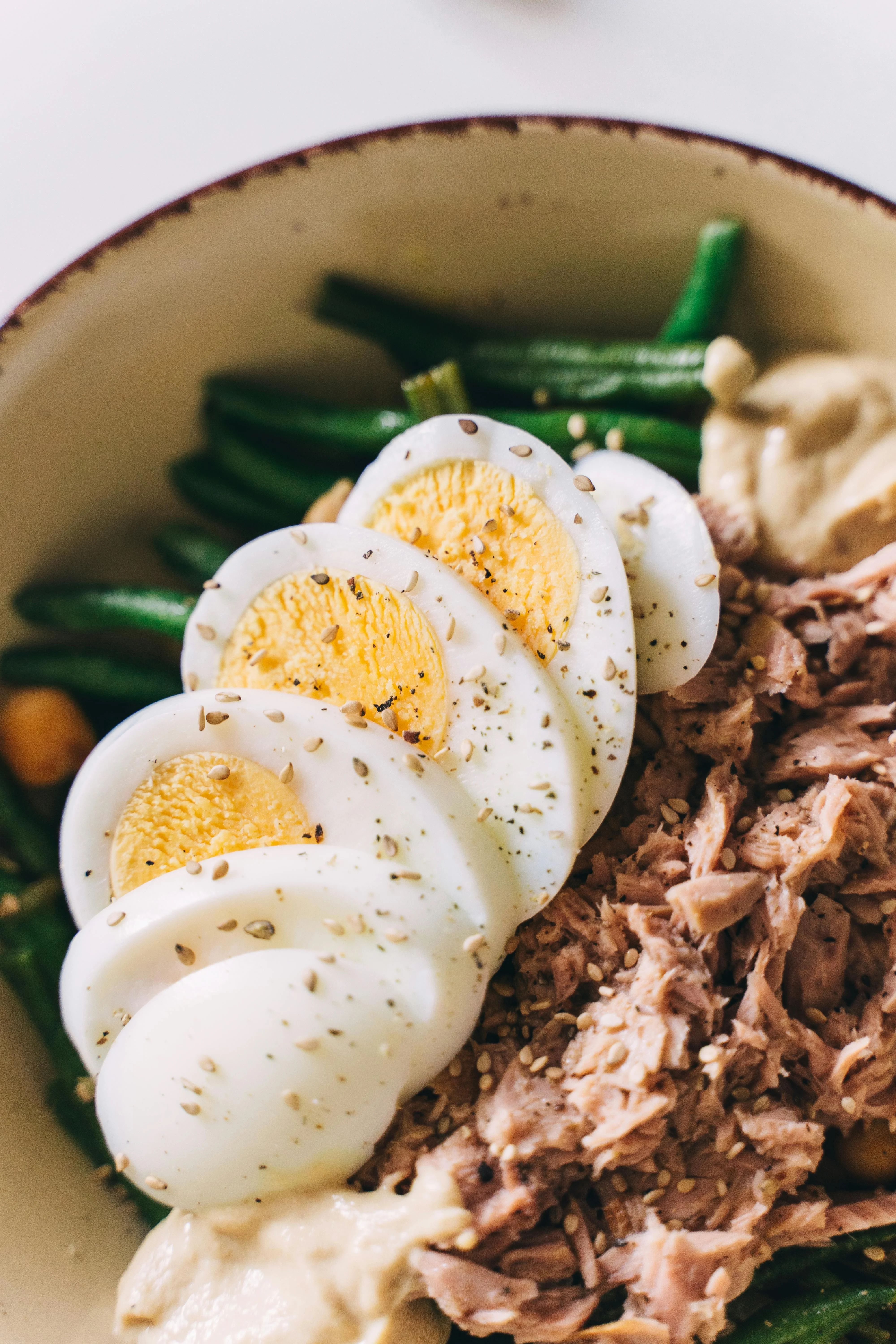 Mediterranean tuna salad bowl with egg and green beans