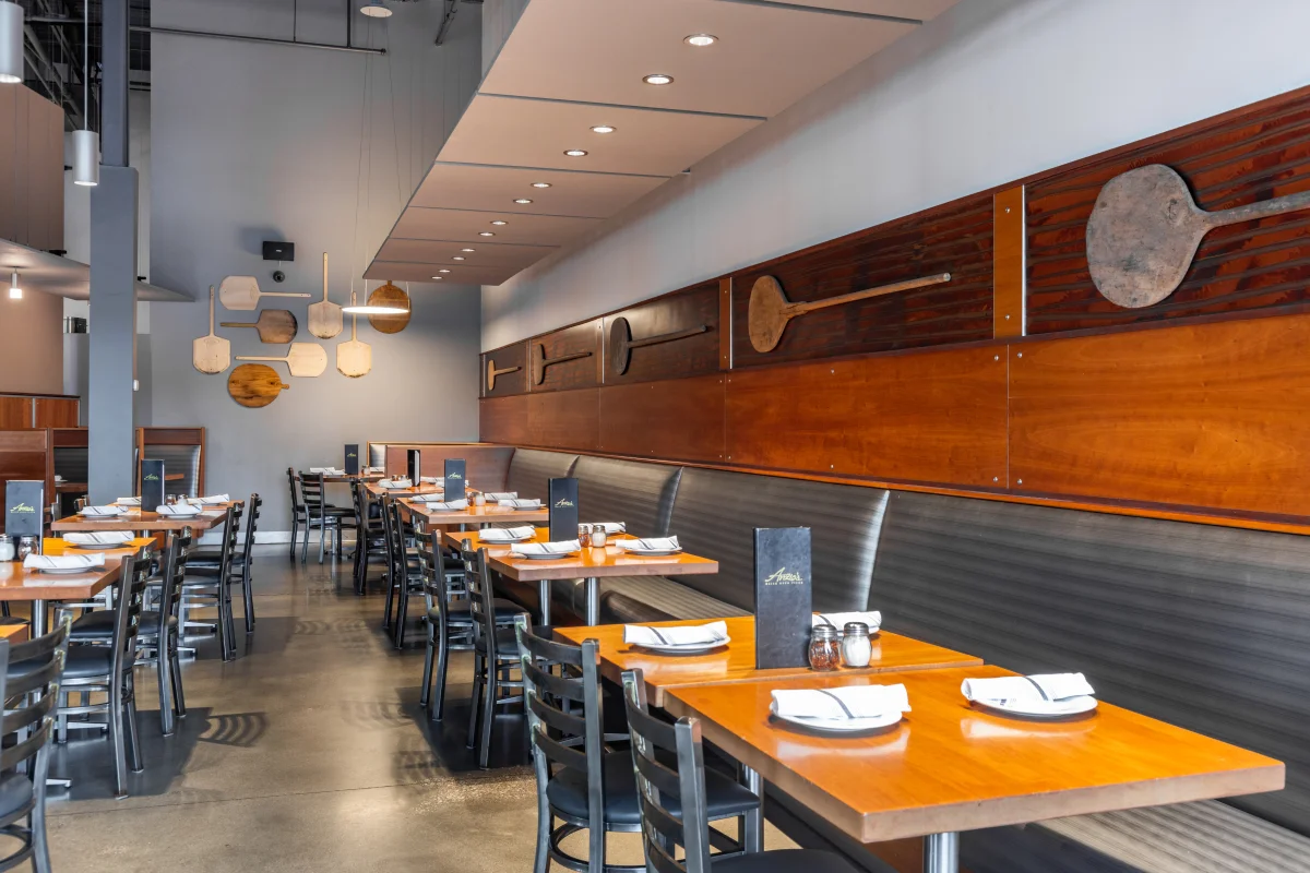 Modern restaurant interior with wooden accents and stylish seating