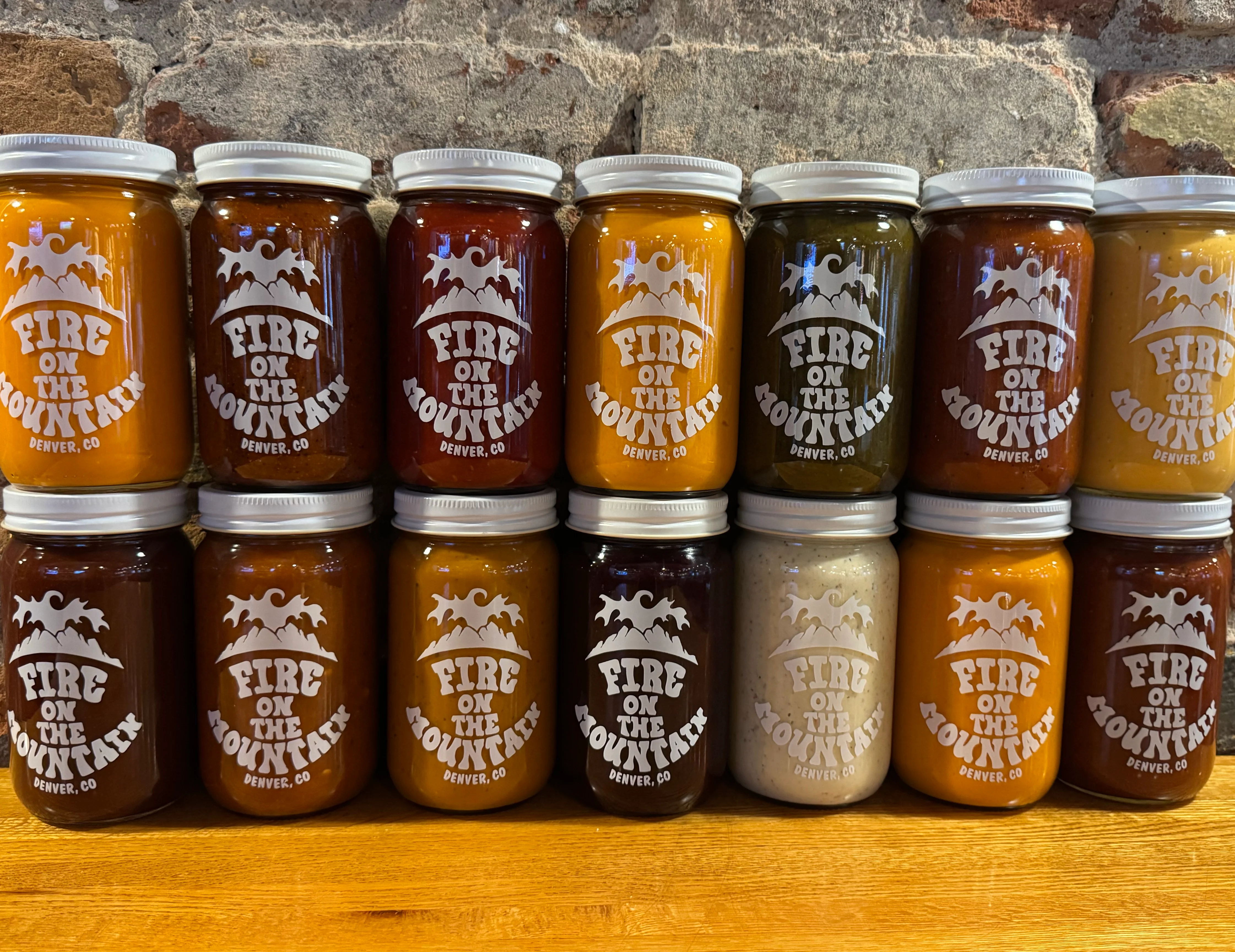 Variety of sauces from Fire on the Mountain in Denver