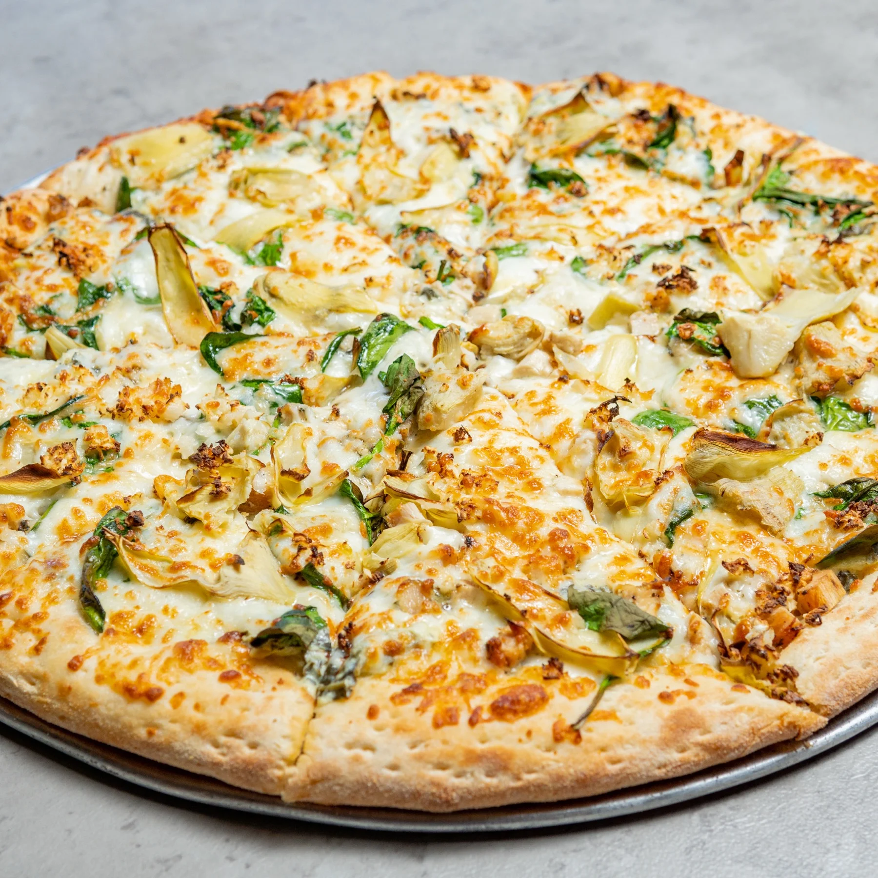 Gluten-free Roasted Artichoke & Spinach pizza from Stadium Pepz in Anaheim