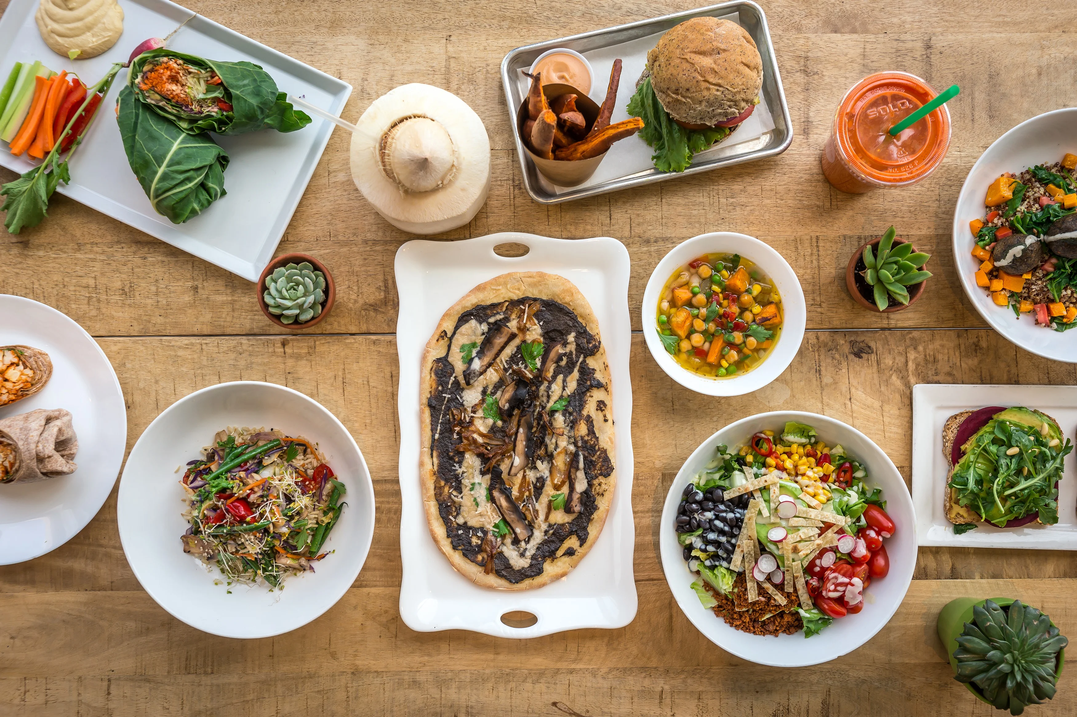 Colorful vegetarian grain bowls and flatbread