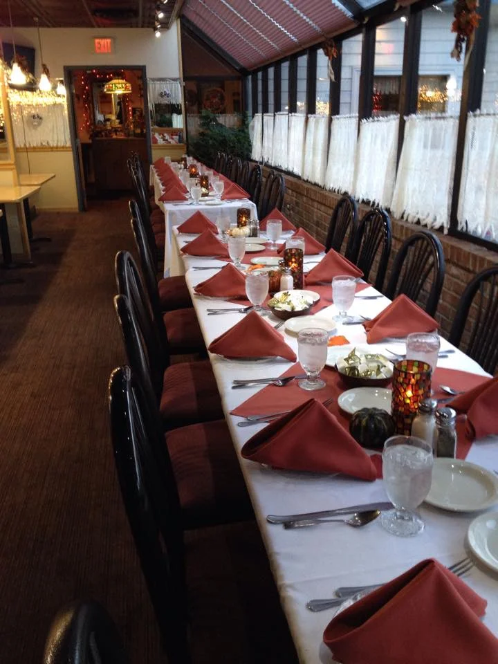Elegant restaurant dining setup with festive decor