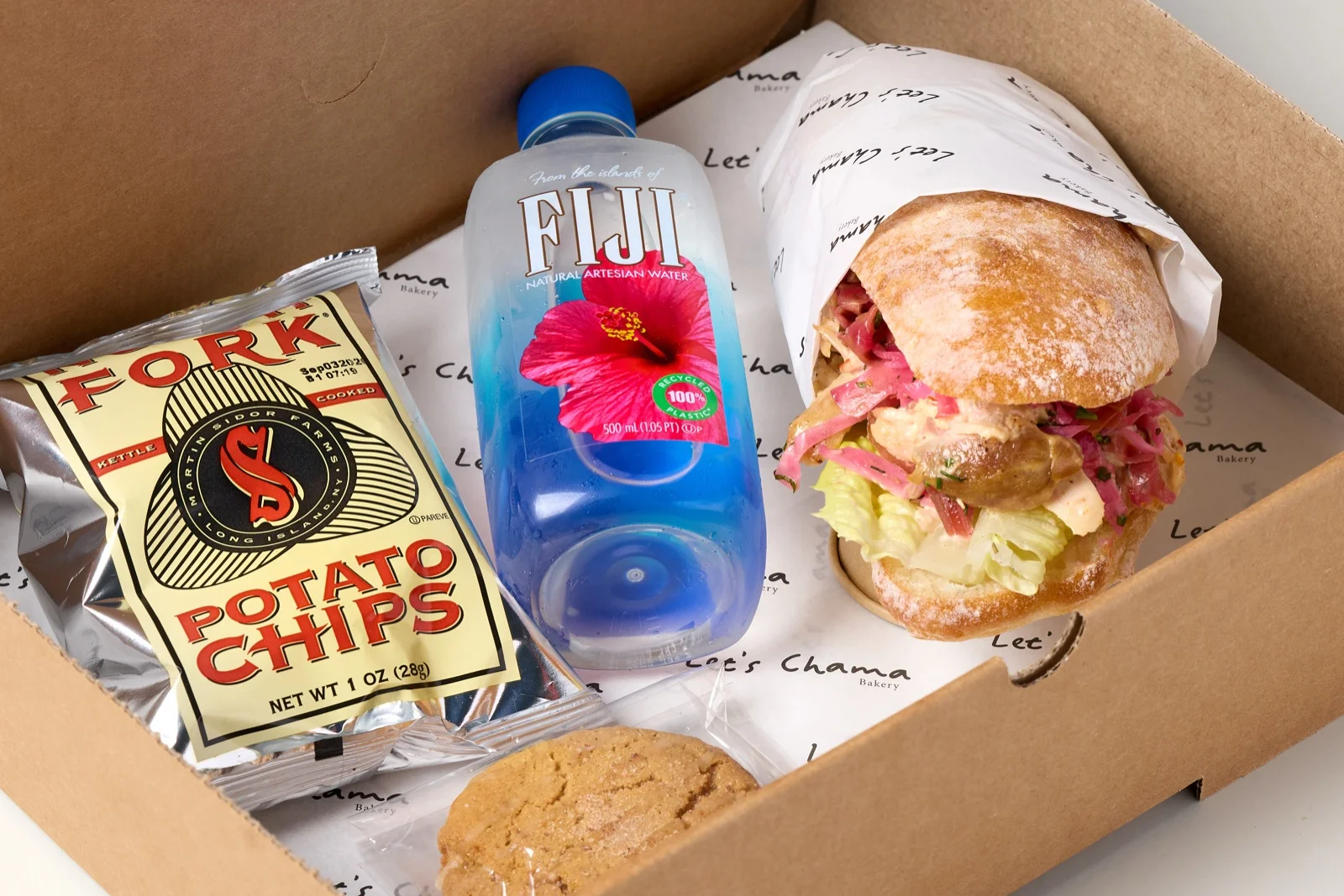 Lunch Box( Sandwich , Cookie, Water, Chips)