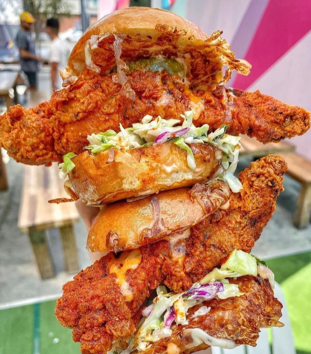 Spicy fried chicken sandwich stacked high