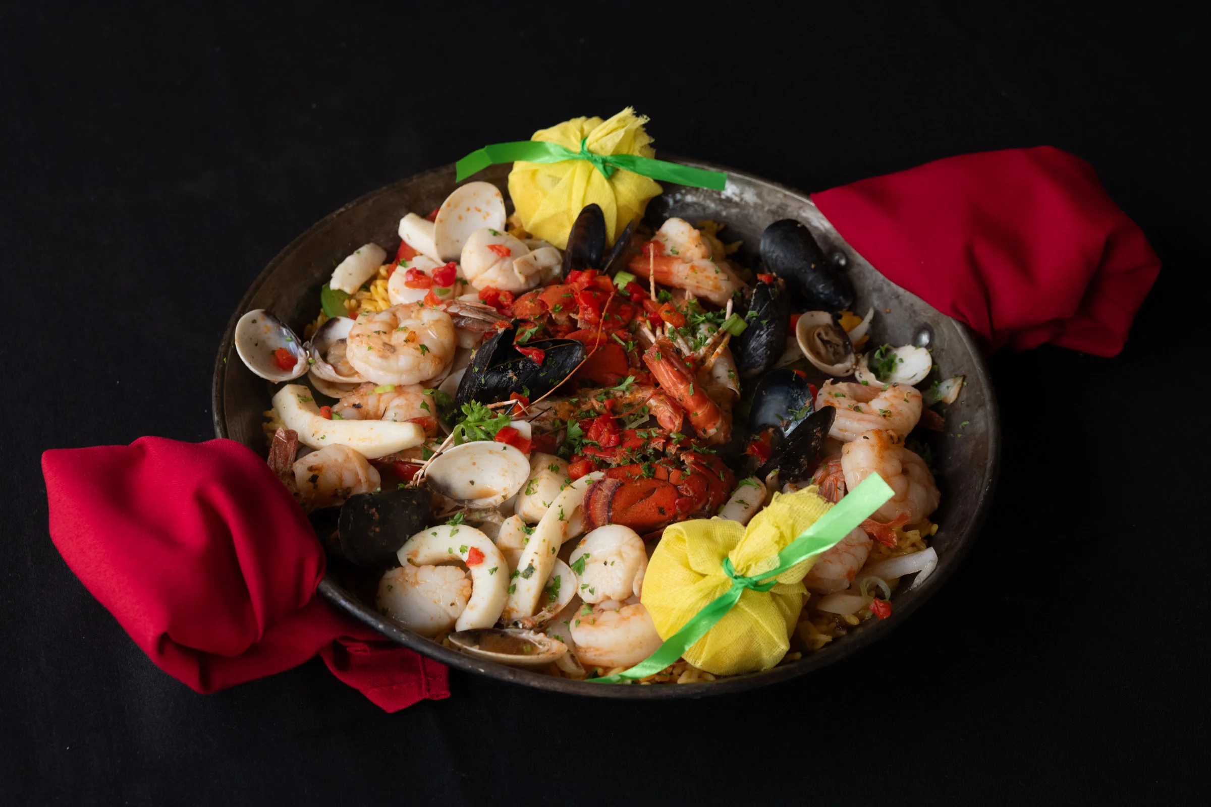 Seafood paella with shrimp, mussels, and clams