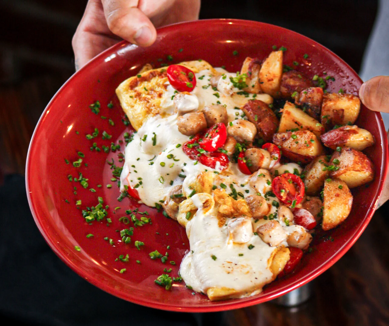 A plate of eggs and potatoes