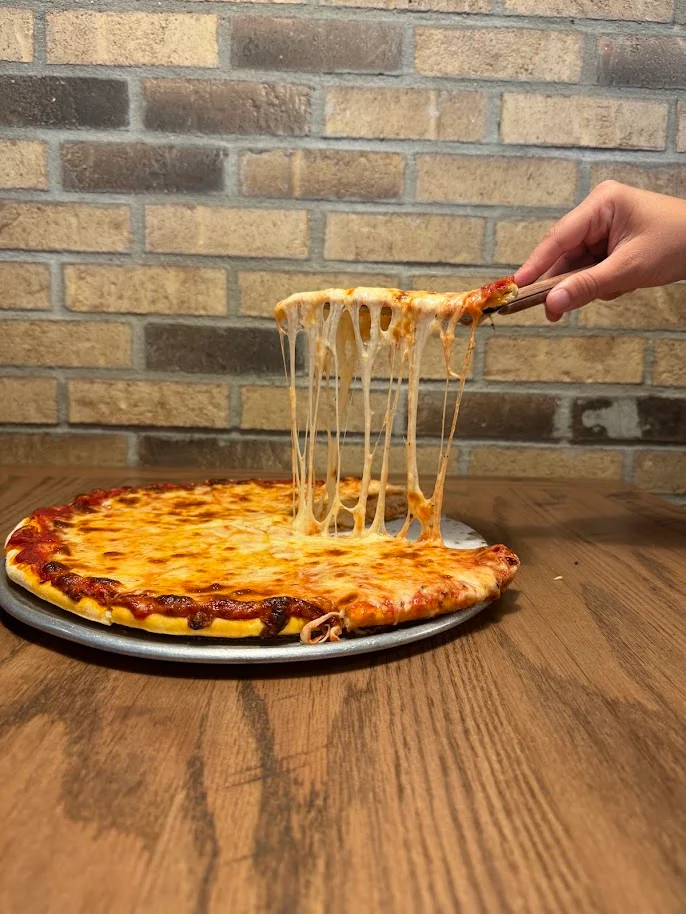 Cheesy Margherita pizza with gooey mozzarella