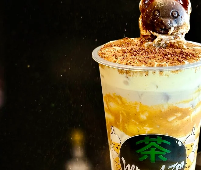 Delicious bubble tea topped with a cute bear chocolate