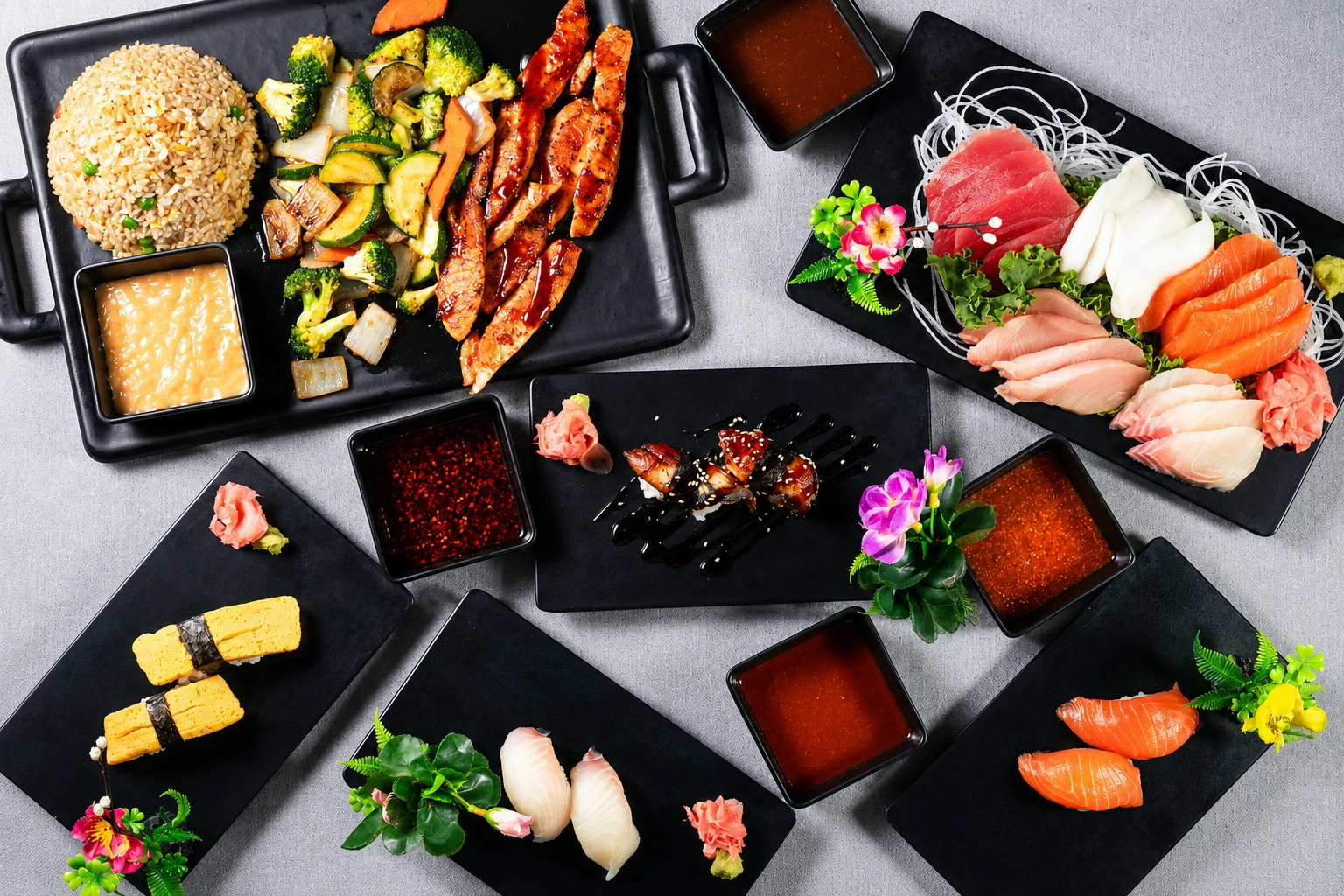 Japanese sushi platter with assorted sashimi and grilled chicken