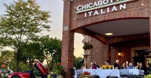 Charming Italian restaurant exterior with outdoor dining