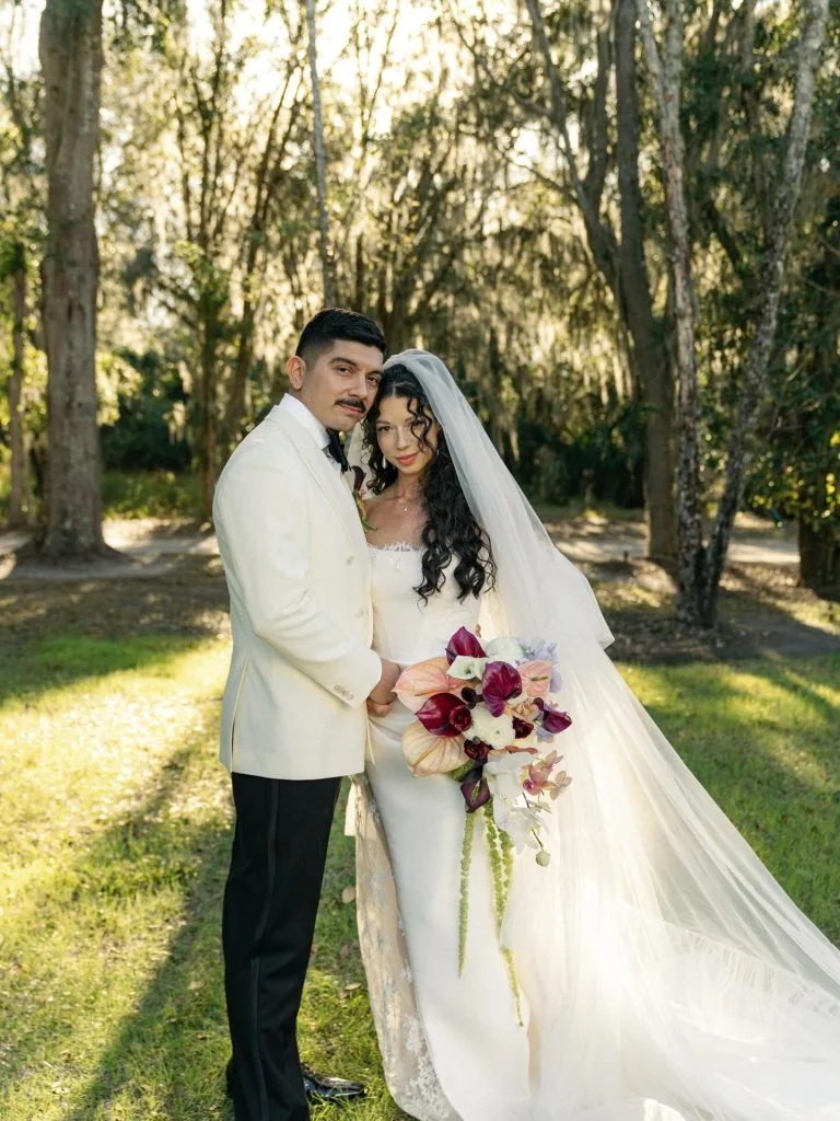 Bride and groom in a romantic outdoor wedding setting