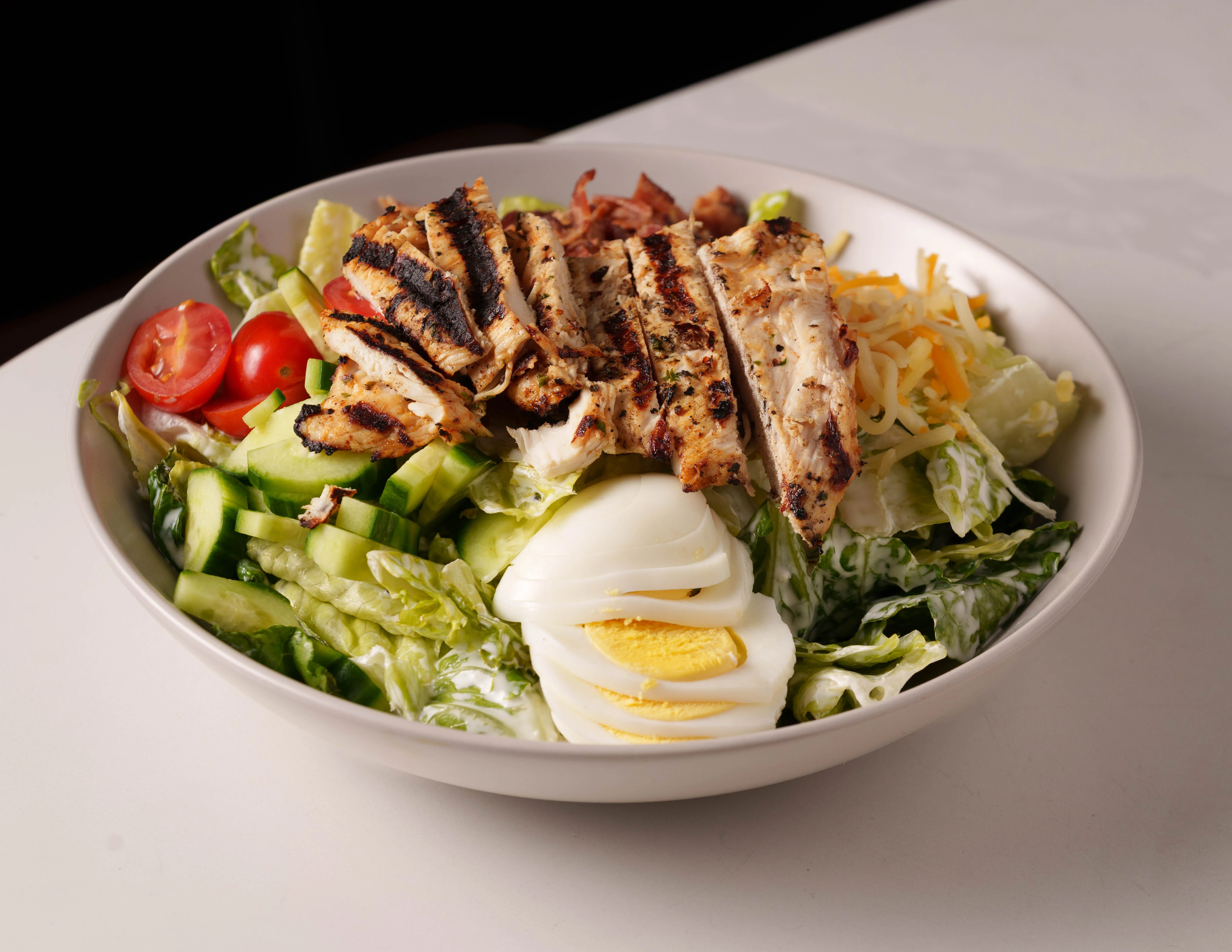 Grilled chicken Caesar salad in a bowl