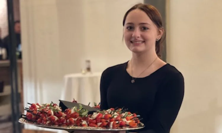 Kyleigh serving up some yummy tomato caprese bites