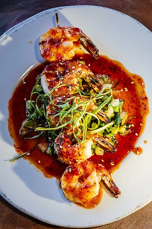Spicy shrimp stir-fry with greens and sauce