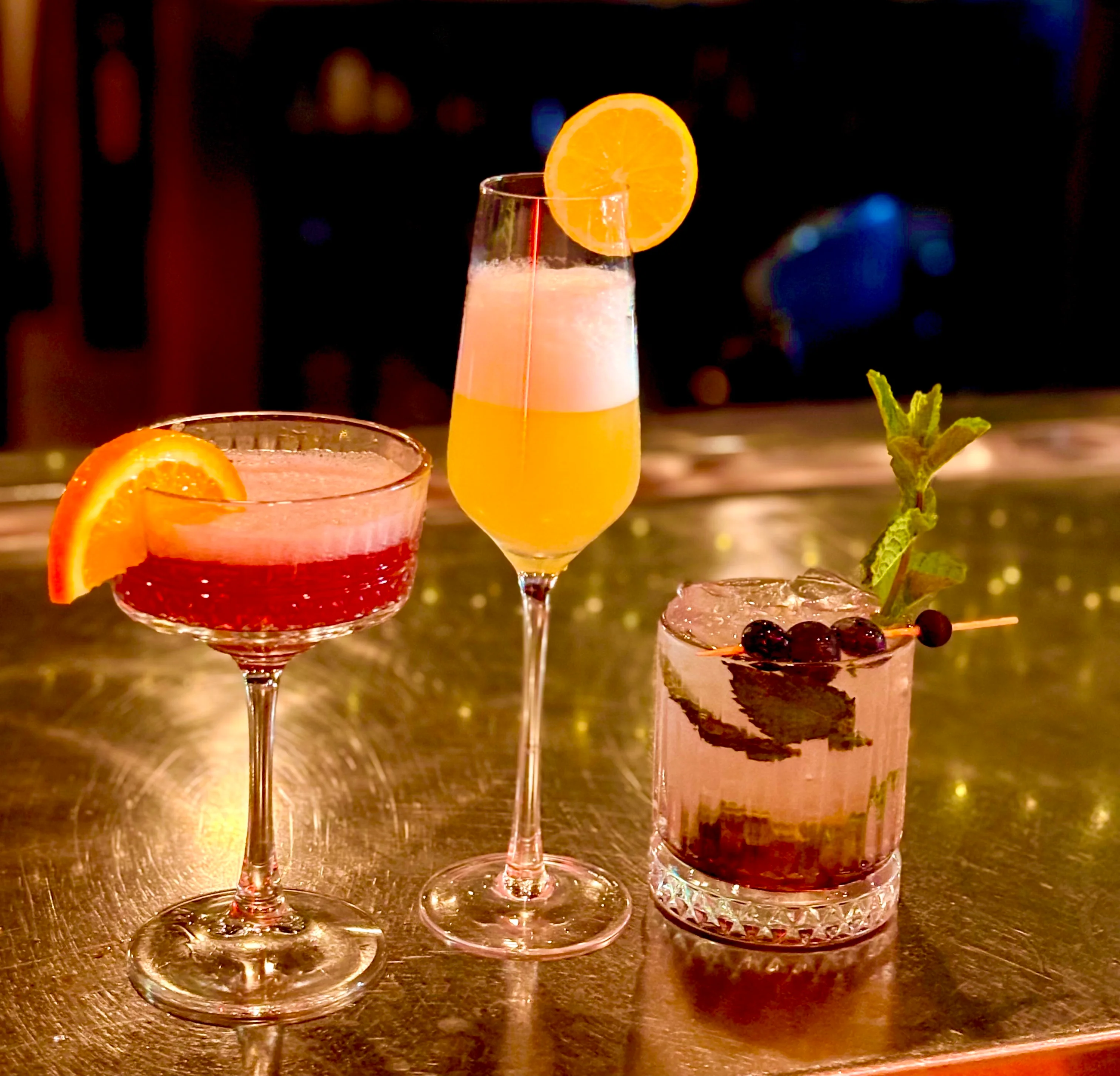 Colorful cocktails on a bar counter at a modern restaurant
