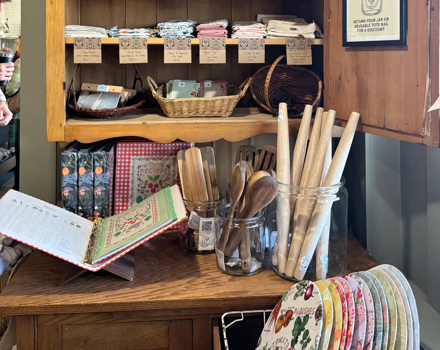 Charming display of kitchenware and textiles in a rustic shop