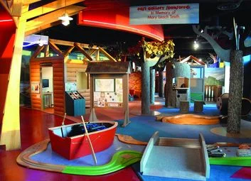 Interactive children's play area with colorful structures