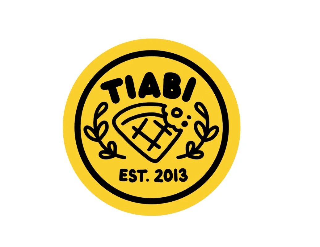 Logo of Tiffany Biscoe's restaurant featuring a circular design.