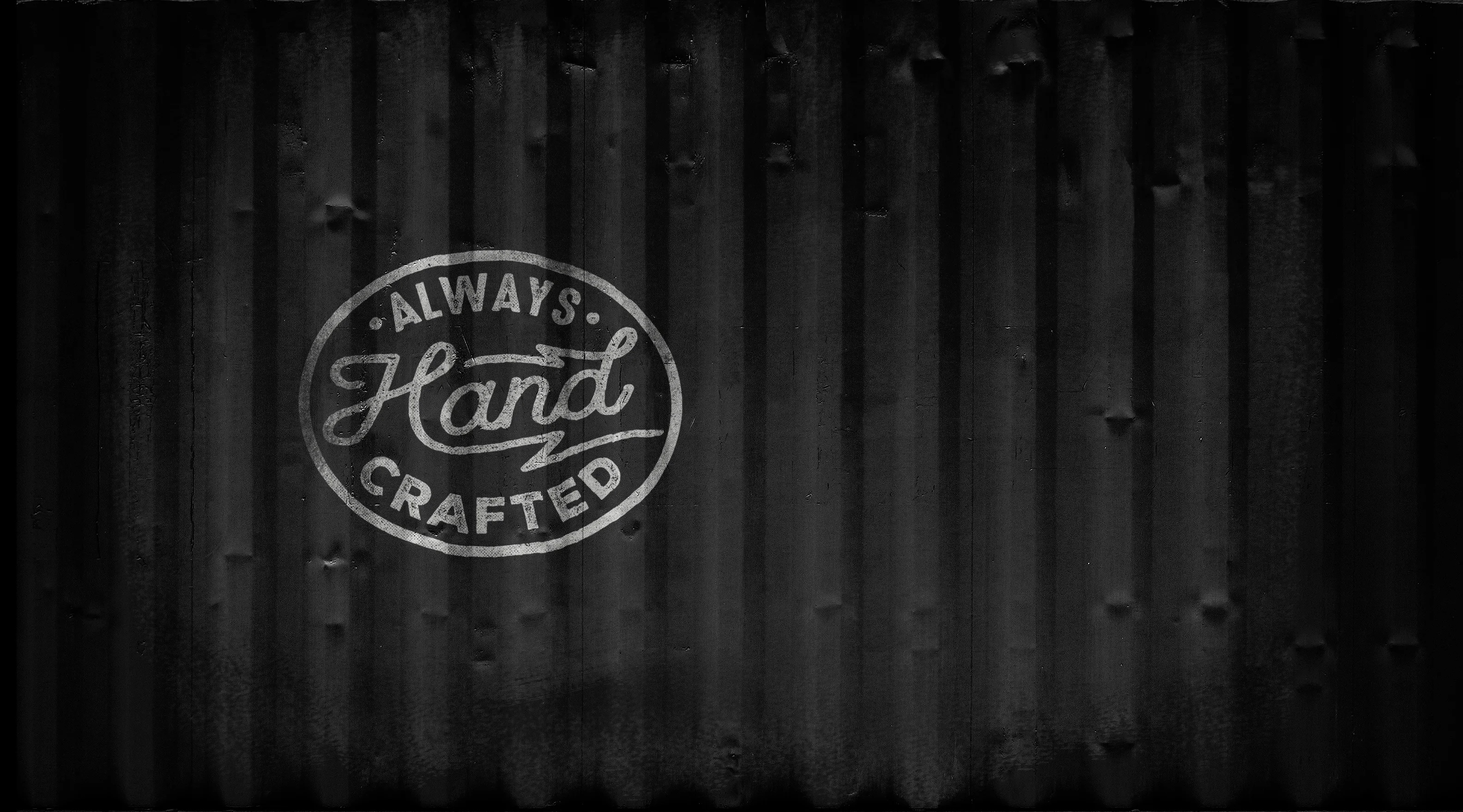Vintage sign reading 'Always Hand Crafted' on a textured background