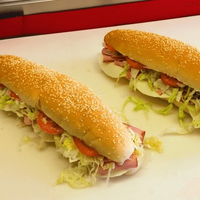 Two freshly made sub sandwiches
