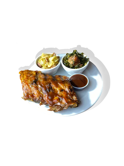 Barbecue ribs with collard greens and cabbage slaw