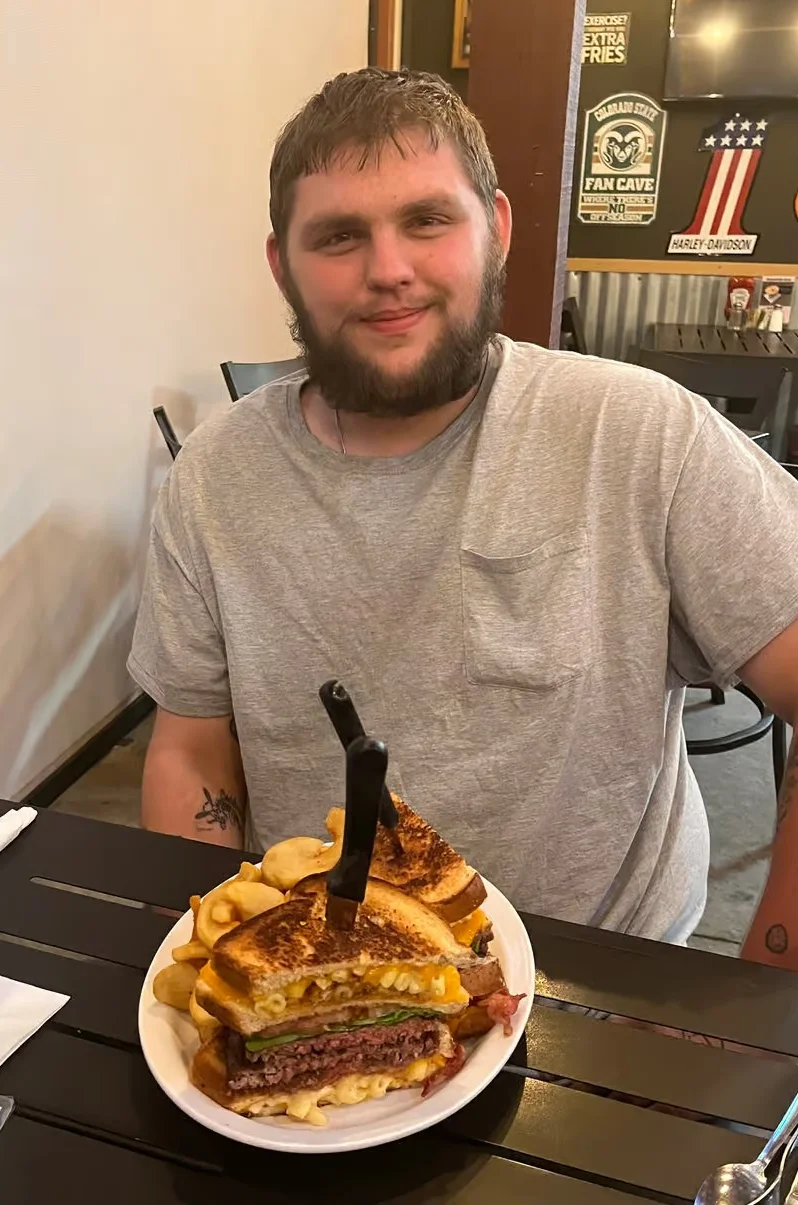 Giant grilled cheese burger stack with fries