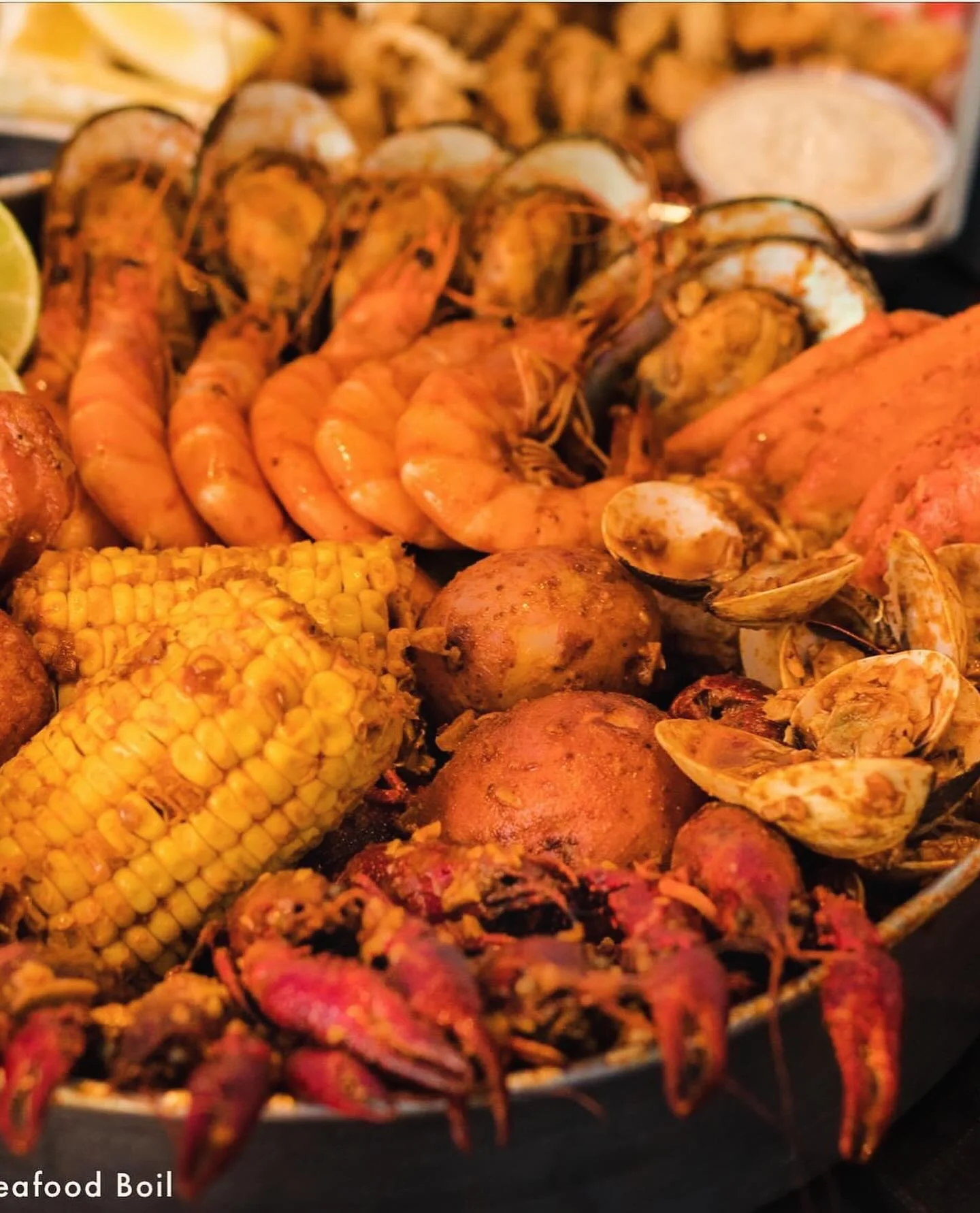 Southern seafood boil with shrimp, crab, and corn