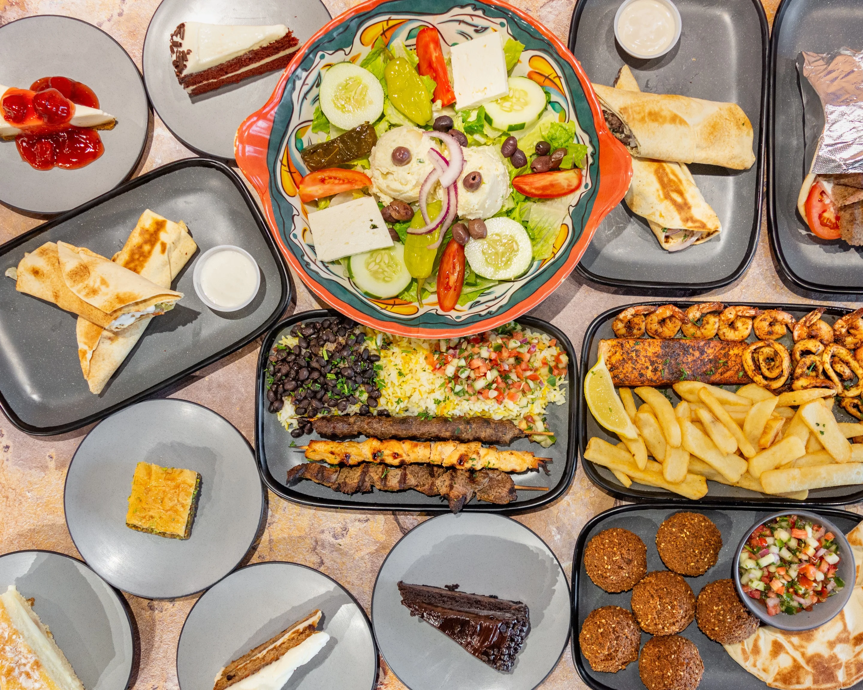 Mediterranean mixed platter with grilled meats and fresh salad