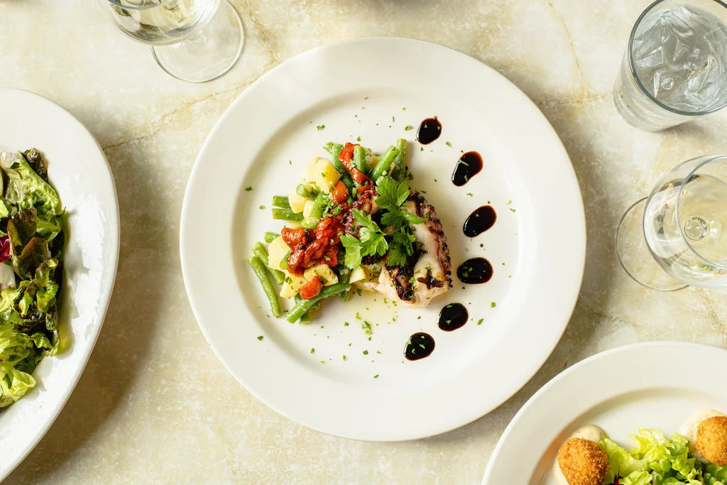 Grilled octopus with vegetables and balsamic glaze
